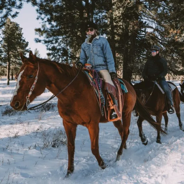 Group of people riding horses